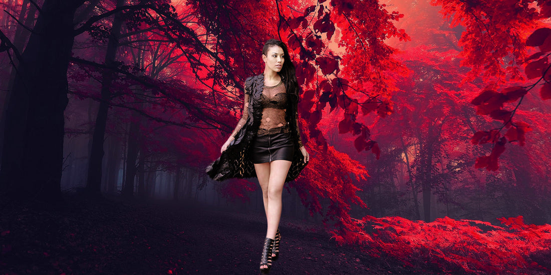 Model in red-leaf forest wearing Belgin Francis leaf-cut jacket